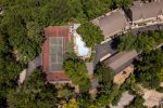 DRONE VIEW OF THE UPPER POOL, TENNIS & BASKETBALL COURT
